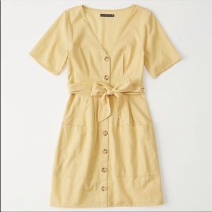 Cute light creamy yellow button down dress